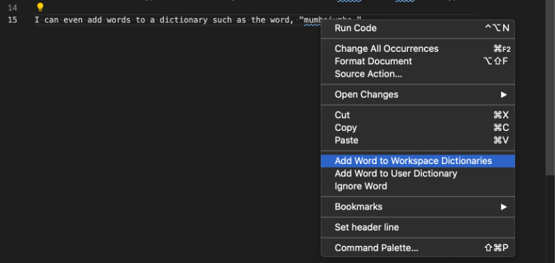 After right-clicking a word with a typo, a menu appears with an option to add mumbojumbo to a user dictionary or workspace dictionary.